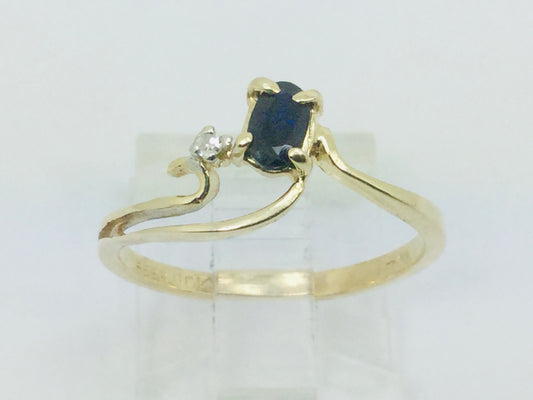 10k Yellow Gold Oval Cut 25pt Sapphire September Birthstone & 2pt Diamond Wave Ring