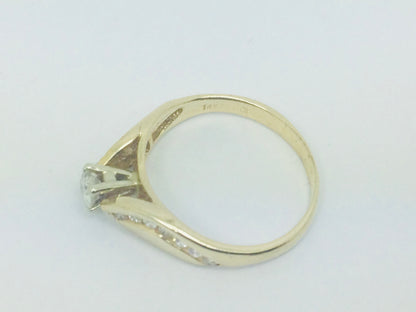 14k Yellow Gold Round Cut 31pt Diamond and Channel Set Accents Ring