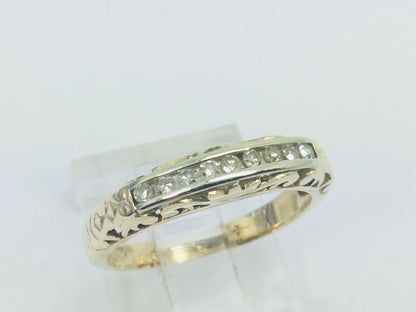 10k Yellow Gold Round Cut 18pt Channel Set Diamond Ring