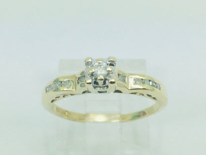 10k Yellow Gold Round Cut 15pt Diamond Illusion Set with Channel Set Accents Ring