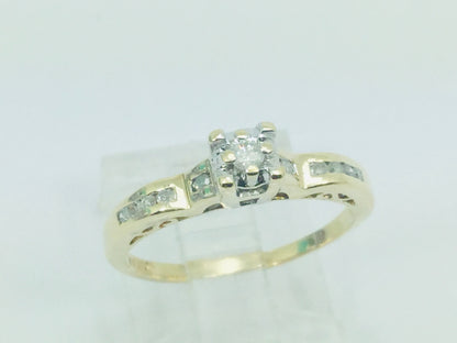 10k Yellow Gold Round Cut 15pt Diamond Illusion Set with Channel Set Accents Ring