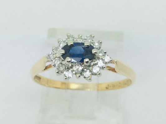 14k Yellow and White Gold Oval Cut 0.35ct Sapphire September Birthstone & 0.30ct Diamond Cluster Ring