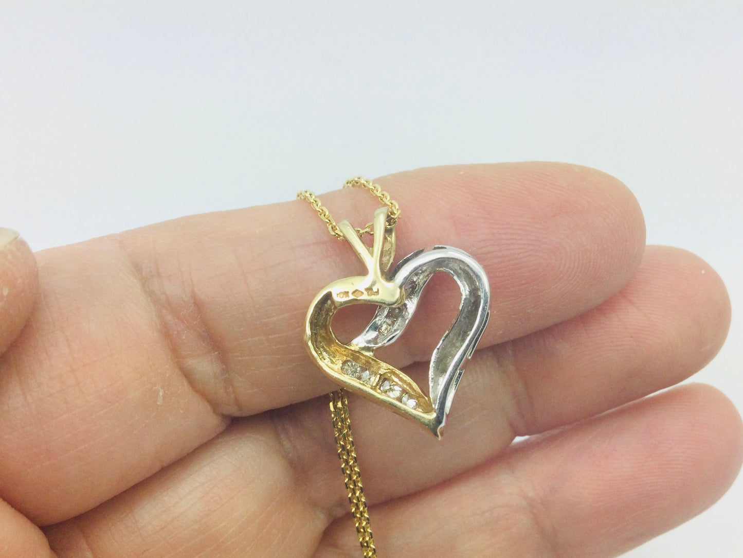 10k White and Yellow Gold Round Cut 18pt Diamond Heart Necklace