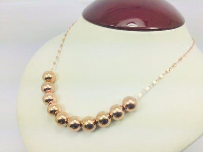 14k Rose Gold Ten Sliding Balls Necklace