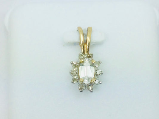 10k Yellow Gold Oval Cut 25pt Topaz & 10pt Diamond Halo Pendent