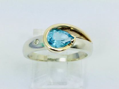 10k White and Yellow Gold Pear Cut Blue Topaz December Birthstone & Diamond Ring