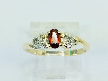 10k Yellow Gold Oval Cut Garnet January Birthstone & Diamond Ring