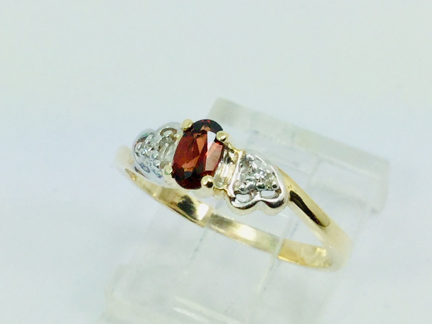 10k Yellow Gold Oval Cut Garnet January Birthstone & Diamond Ring