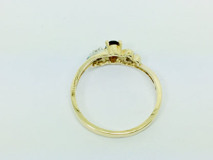 10k Yellow Gold Oval Cut Garnet January Birthstone & Diamond Ring