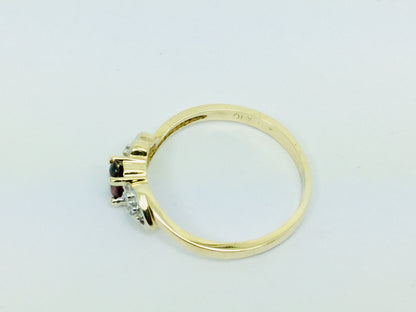 10k Yellow Gold Oval Cut Garnet January Birthstone & Diamond Ring